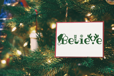 Believe card with Christmas icons incorporated into the words.