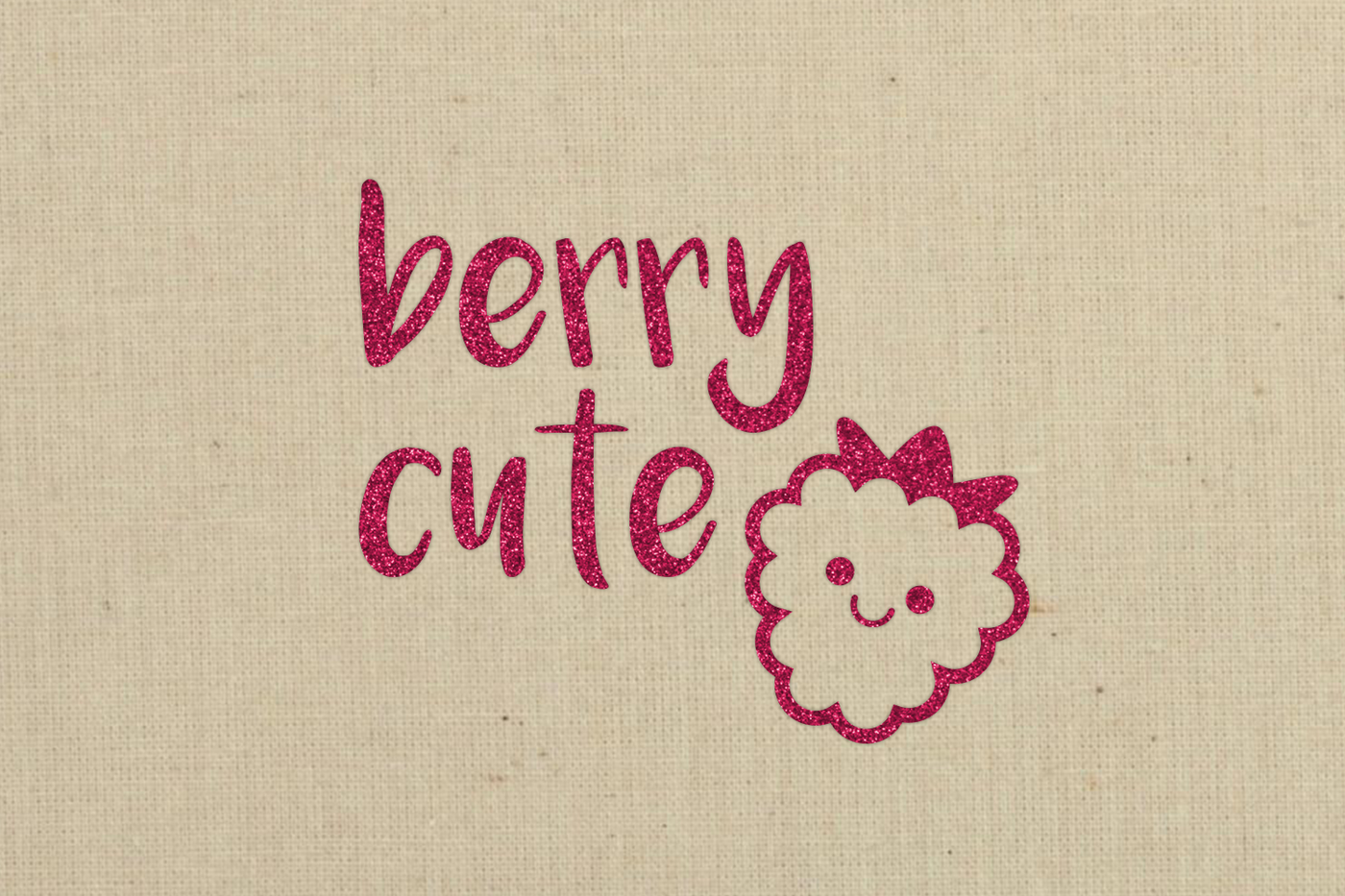 Beige fabric with fuchsia glitter vinyl design. Design says "berry cute" with a smiling raspberry.