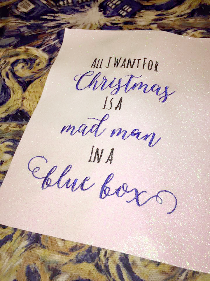 Embroidery design that says "all I want for Christmas is a mad man in a blue box."
