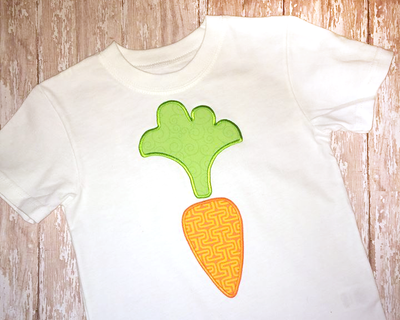 A white shirt with a cute carrot applique.