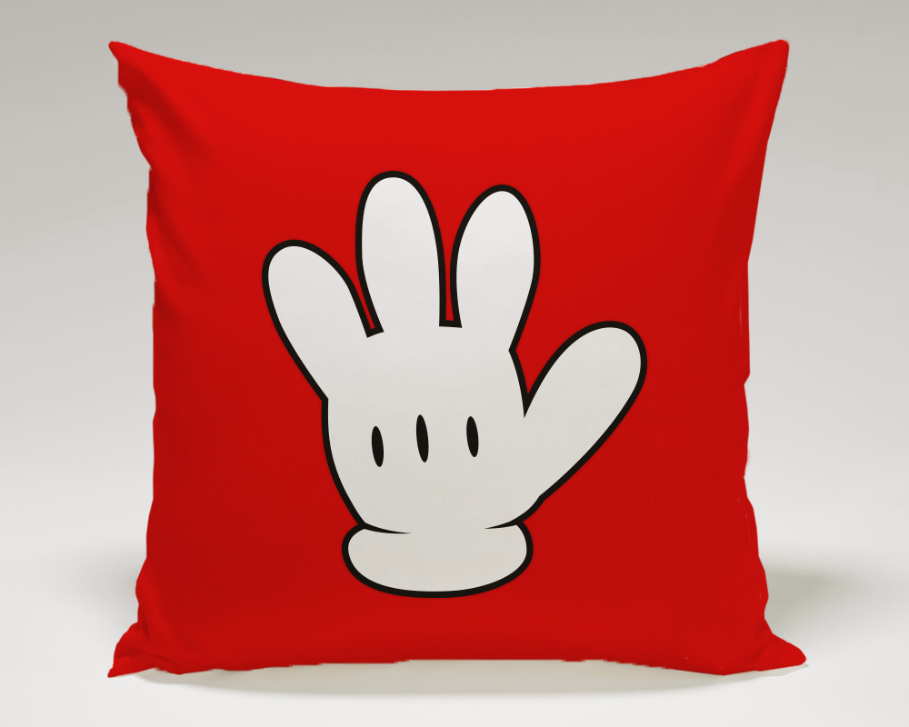 A classic white cartoon glove on a square red throw pillow.
