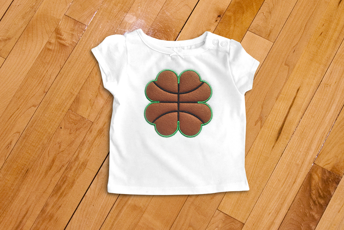 Applique clover with basketball lines.
