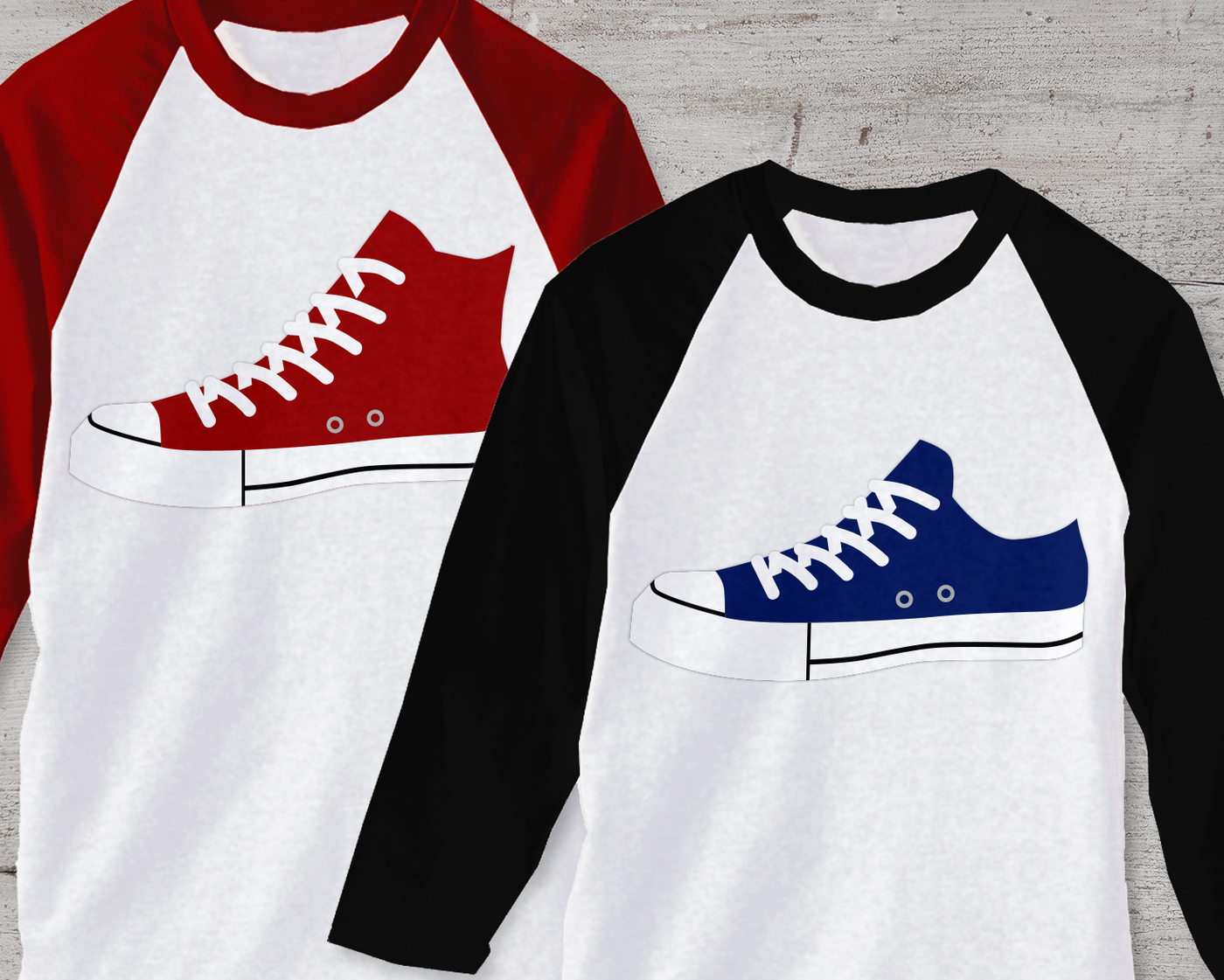 Two raglan tees, each with a Converse style sneaker design. The left is a red high top, the right is a blue low top.