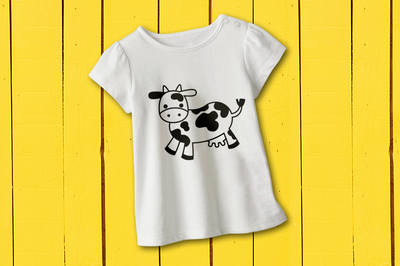 Cow done in a single color on a white tee.
