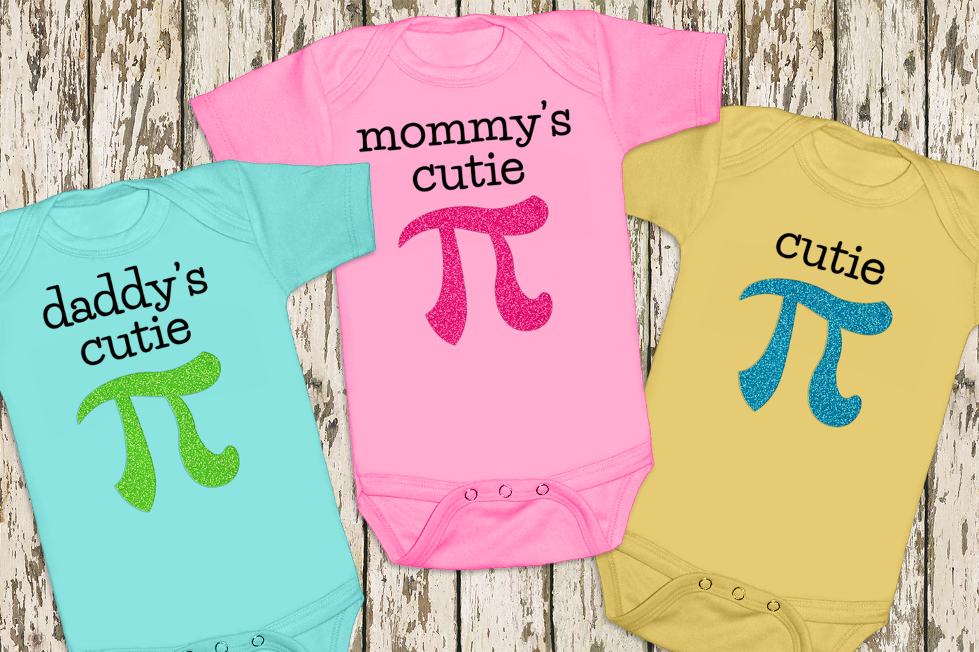 Three baby onesies in pastel colors. Each has a large pi symbol in glitter vinyl. One says "daddy's cutie," one says "mommy's cutie," and one says "cutie." When read with the pi symbol, these read as "cutie pie."