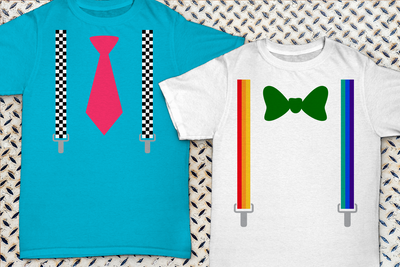 Two kids tees. One has a neck tie with checkered suspenders. The other has rainbow stripe suspenders with a bow tie.