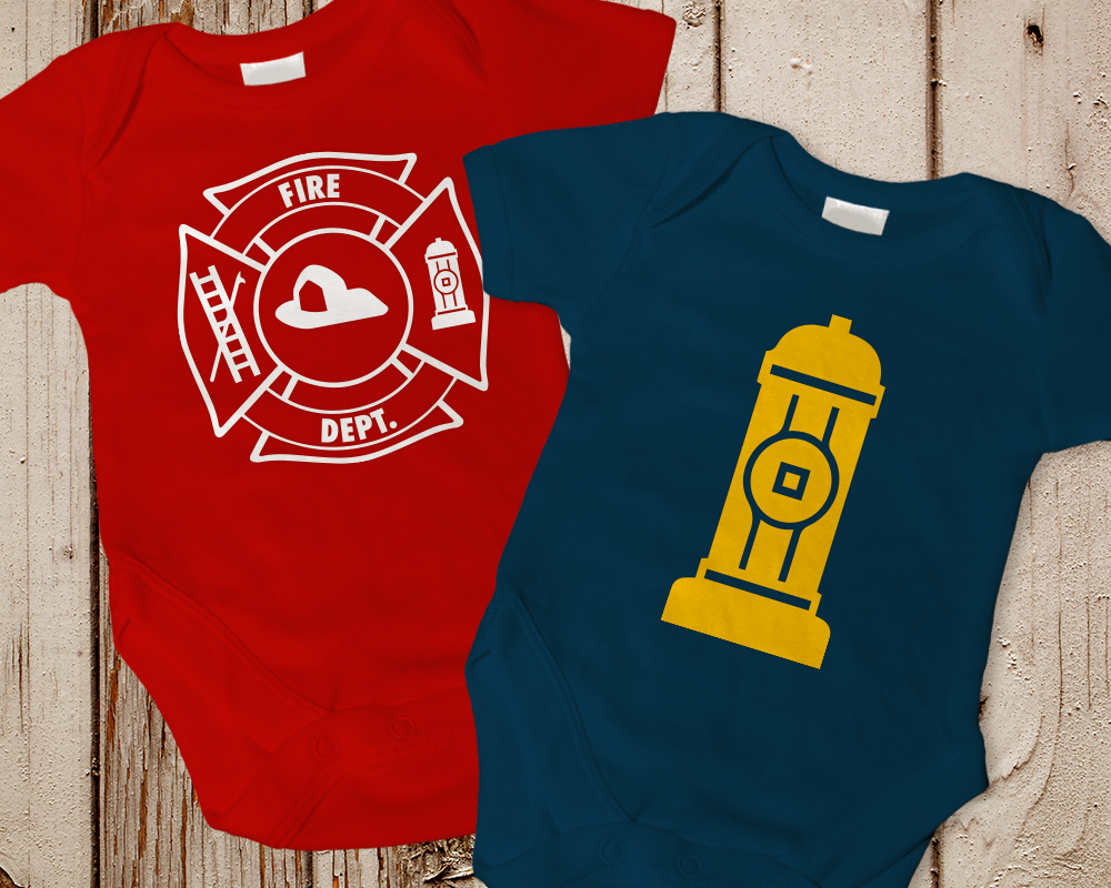 Two baby onesies. One has a fire fighter emblem, the other has a fire hydrant.