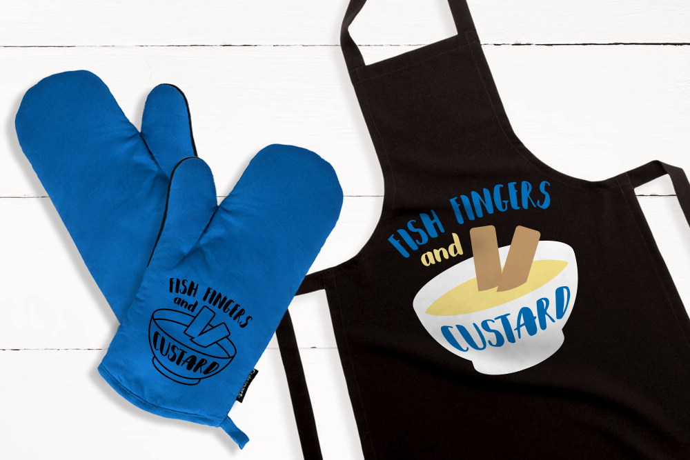 An apron and oven mits. Each has a pair of fish sticks in pudding with the words "Fish fingers and custard"