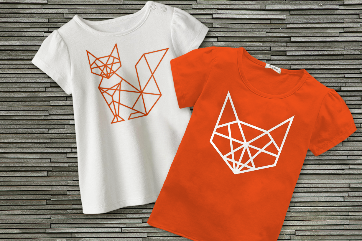 Two shirts, each with a geometric fox. One has a whole fox, the other has just a fox face.