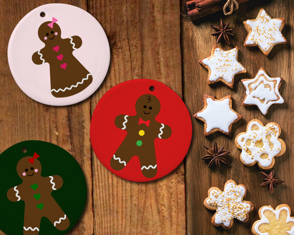 Three different gingerbread designs on flat holiday ornaments.