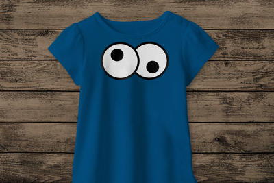 A blue tee with a googly eyes design