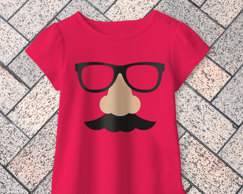 A hot pink shirt with a Groucho Marx style joke glasses design.