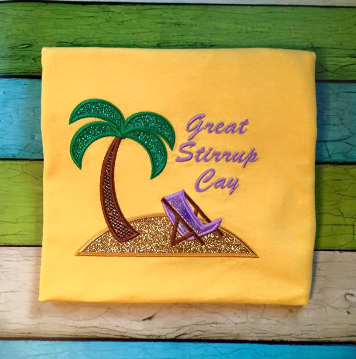 Island with palm tree and beach chair applique