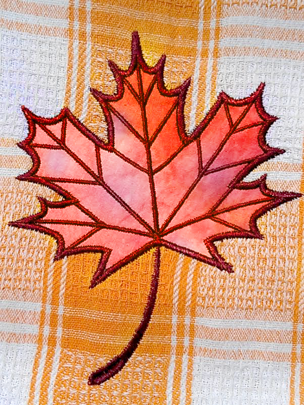 Maple leaf applique design.