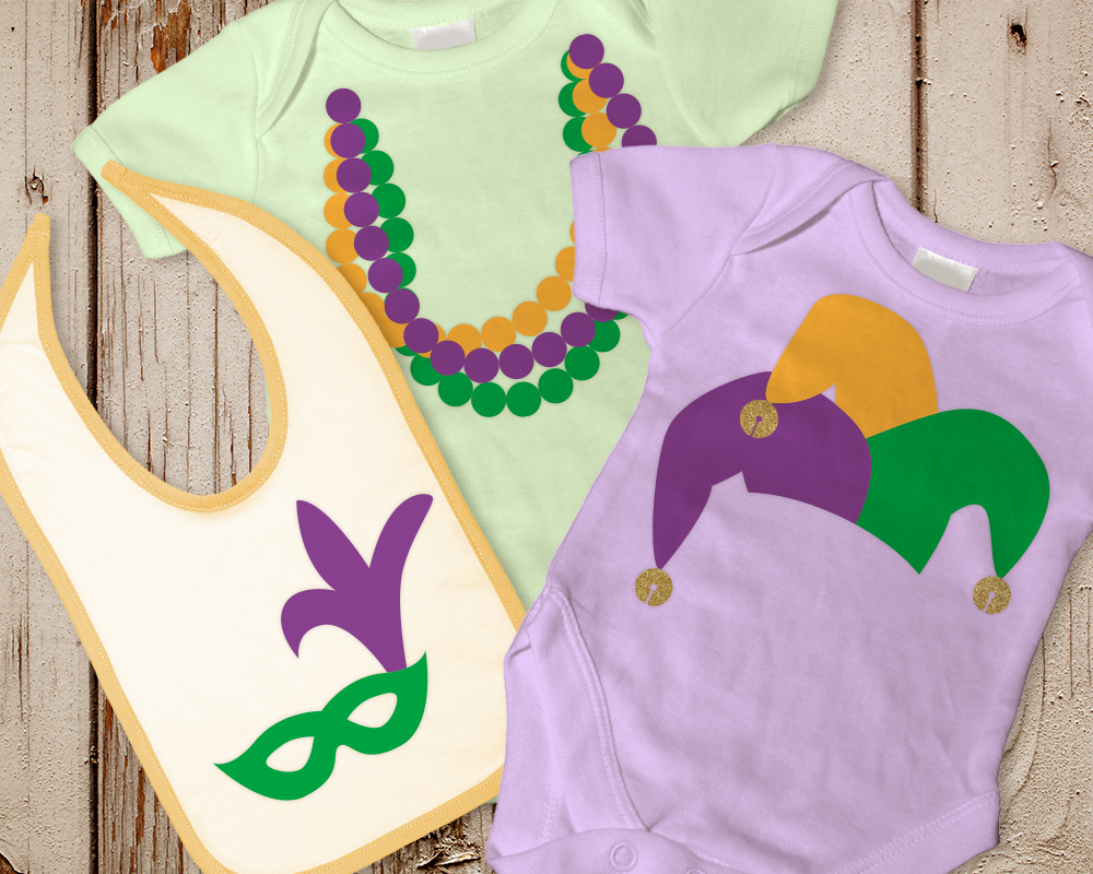 Trio of Mardi Gras designs on baby clothes. There is a  tri-colored jester hat, a mask, and beads.