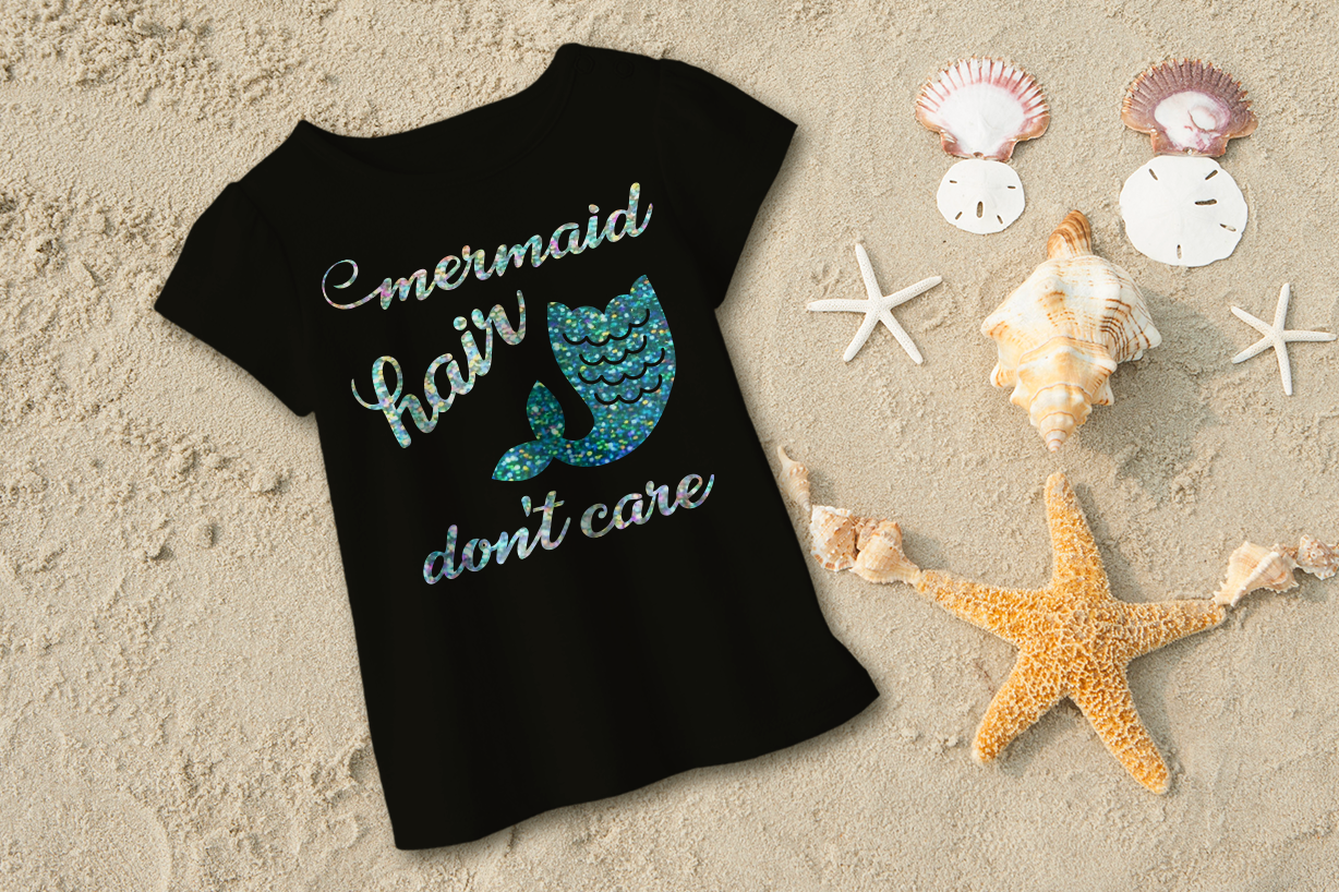 Shirt with a mermaid tail design that says "mermaid hair don't care."