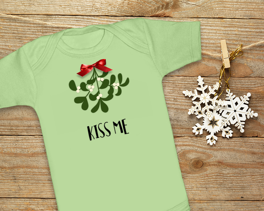 onesie with a mistletoe design that says "kiss me"