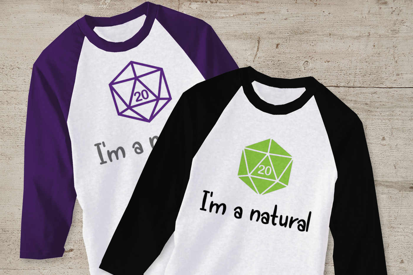 Two raglan tees. Each says "I'm a natural" with a D20 showing the number 20 above.