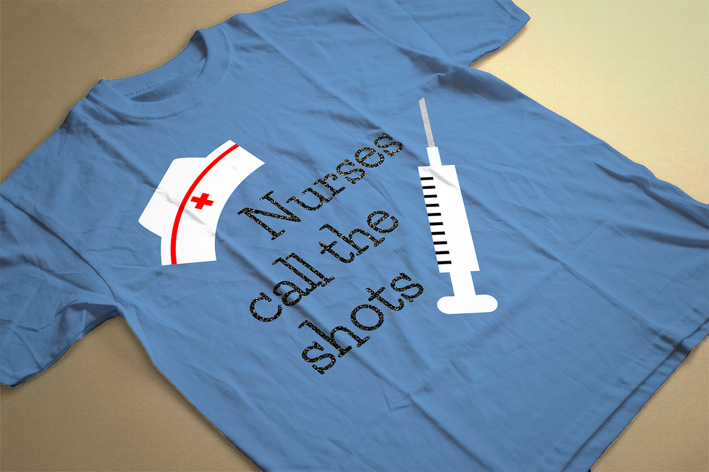 Nurse hat and syringe design with the words "Nurses call the shots"