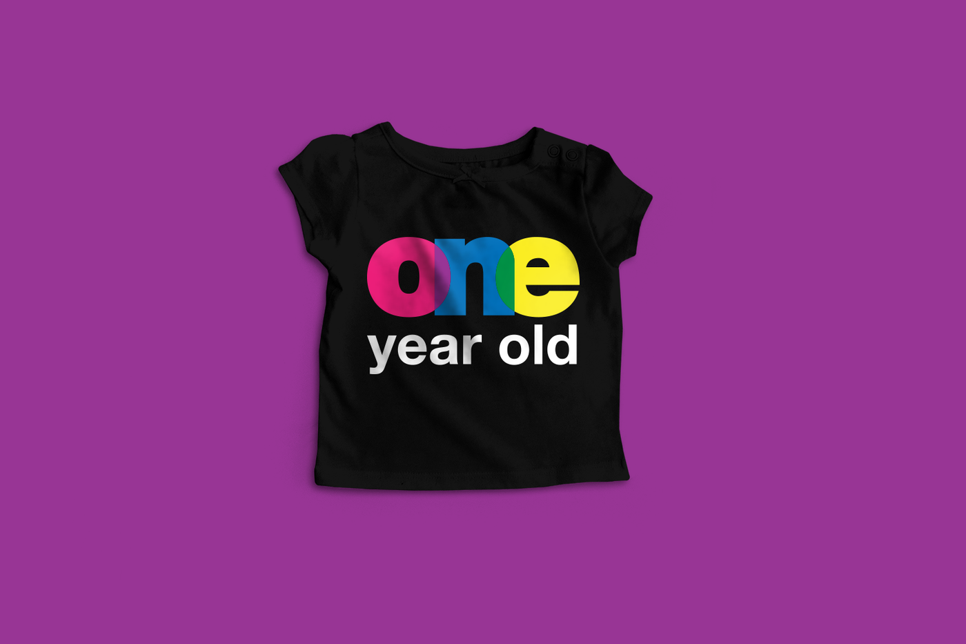 Tee that says "one year old." the letters in one overlap to form new colors