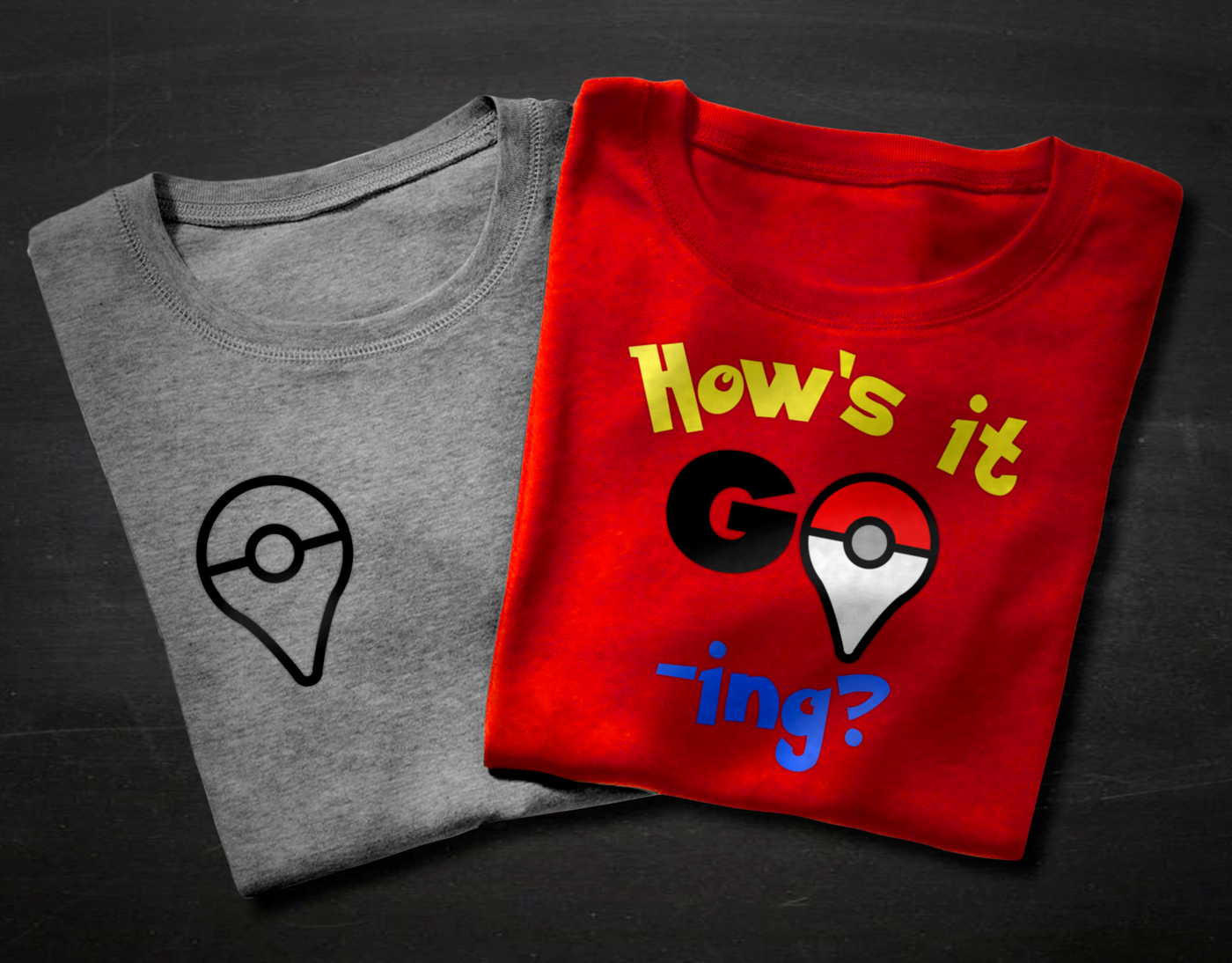 Two shirts. One says "How's it Go-ing?" with a red and white marker for the O. The other shirt only has the marker.