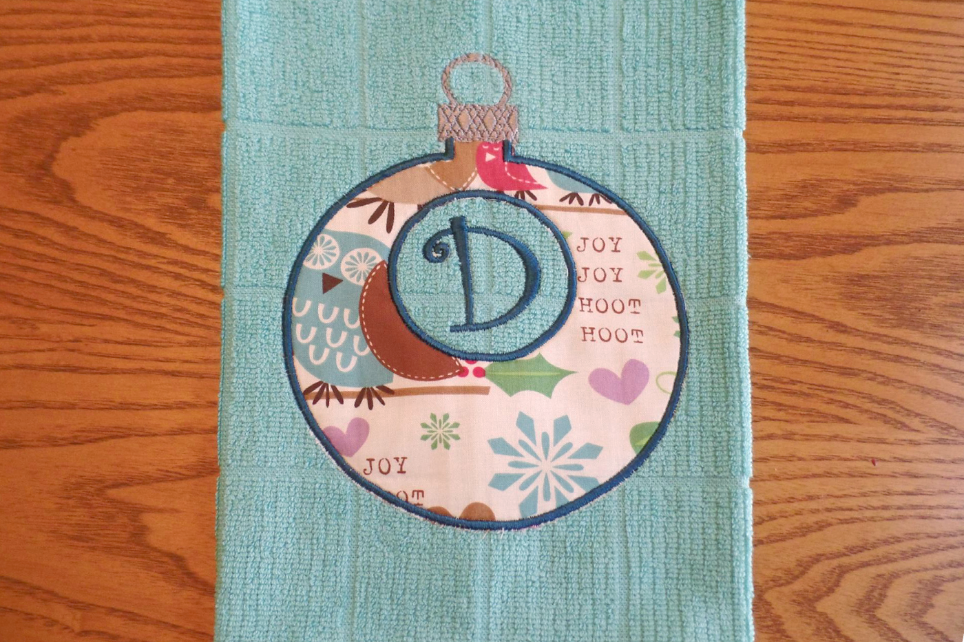 Round ornament applique with a circle inside for adding a monogram