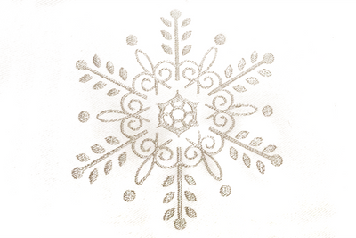 An intricate silver snowflake embroidery on white fabric.