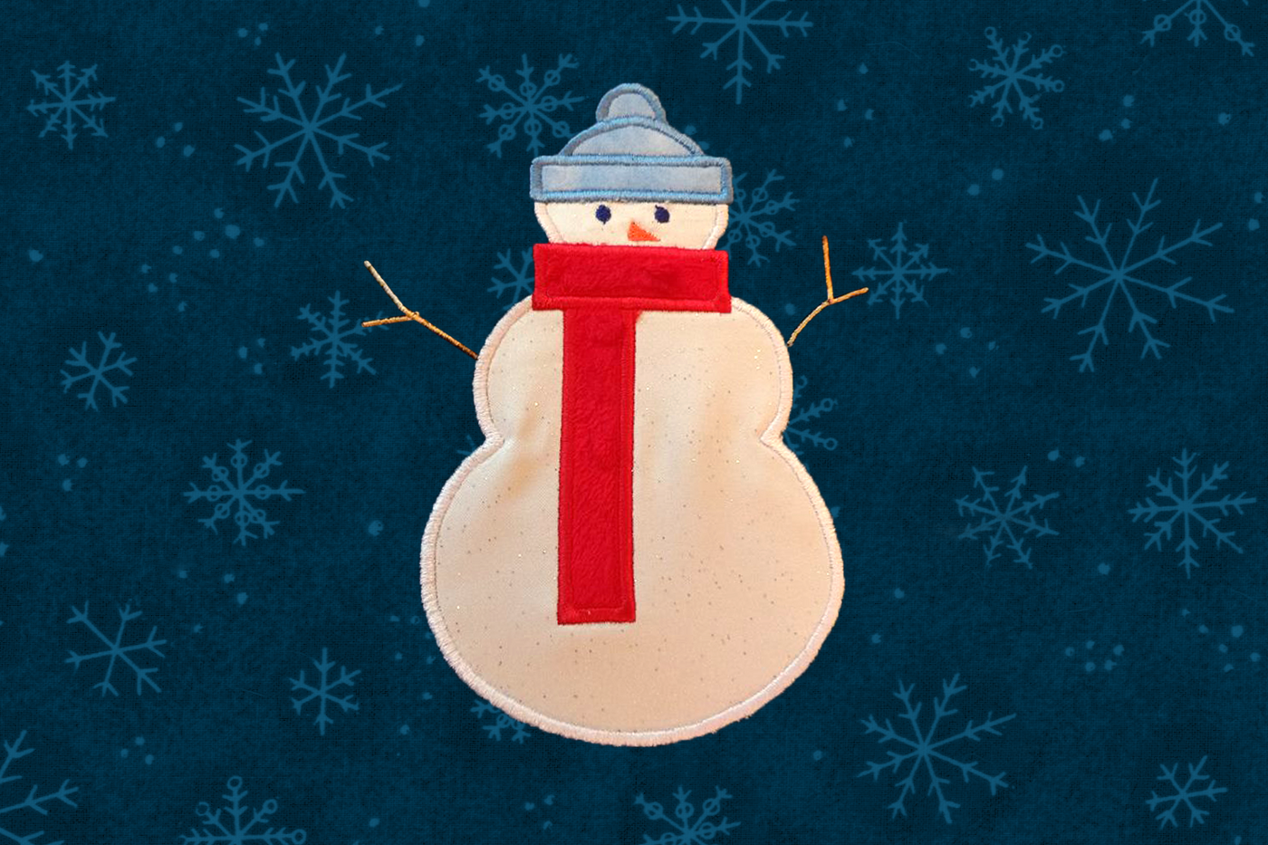 Snowman with a scarf applique design