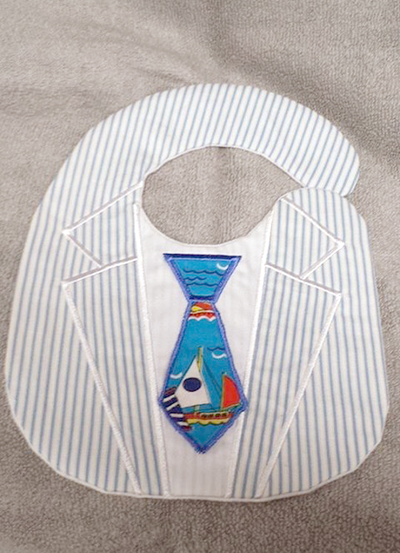 Bib that looks like a suit with a tie.