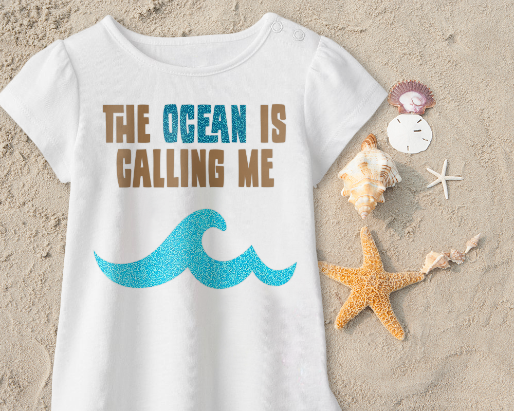 Shirt that says "the ocean is calling me" with a wave.