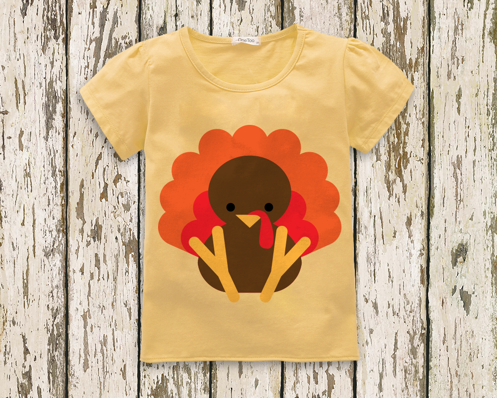 A cute turkey on a butter yellow child's tee.