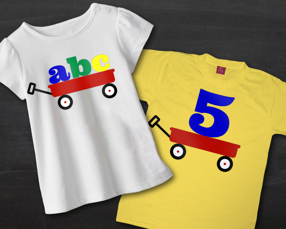 Two shirts. Each has a red wagon design. One has "abc" in the wagon, the other has a large number 5 in the wagon.