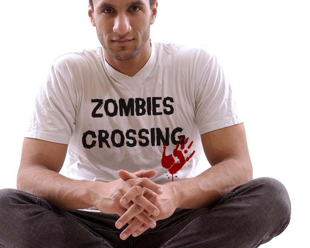 Middle Eastern man wearing a zombies crossing with bloody handprint design